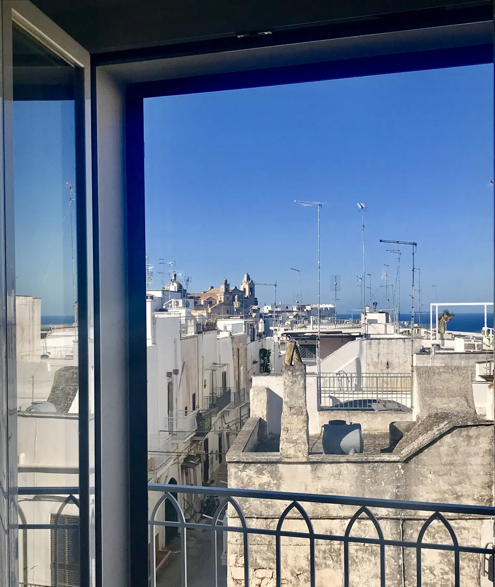 Balcony view over the old town to the sea