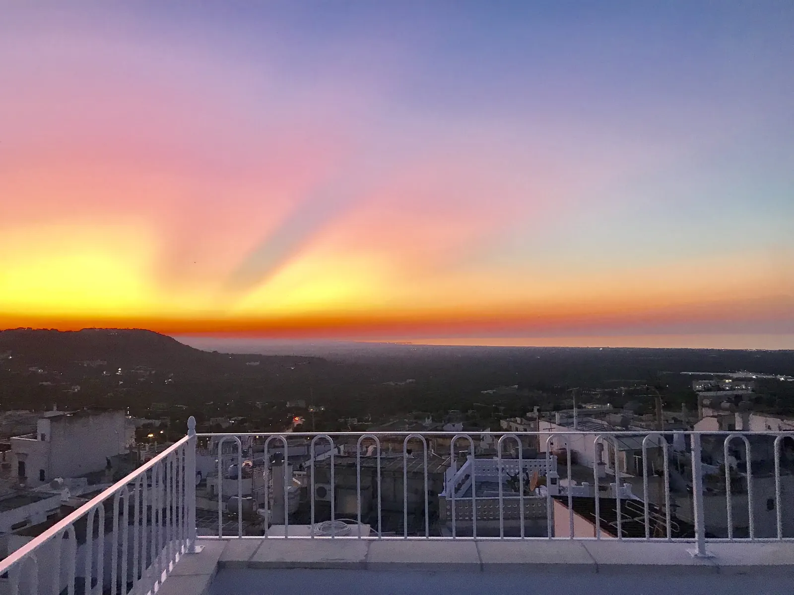 Sunset over the coast from the terrace