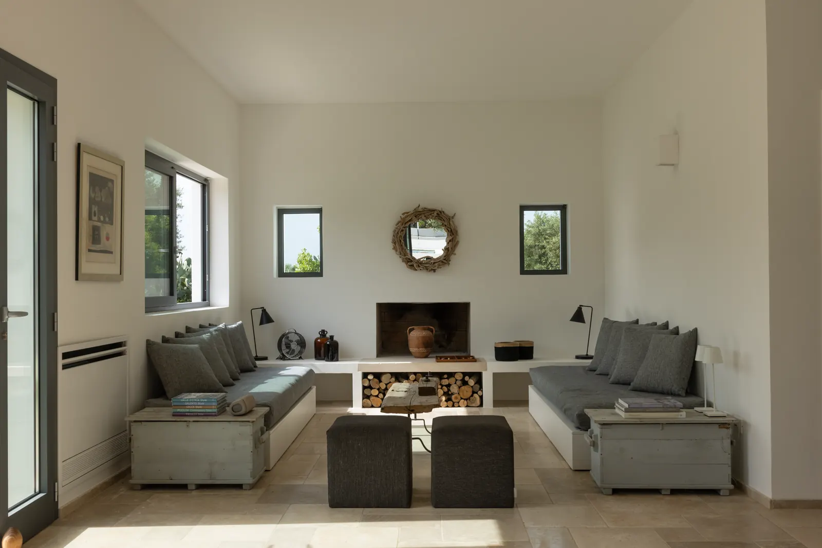 Sitting room with fireplace and built-in sofas