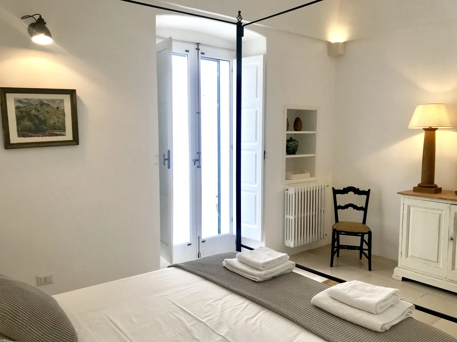 Bedroom with balcony doors