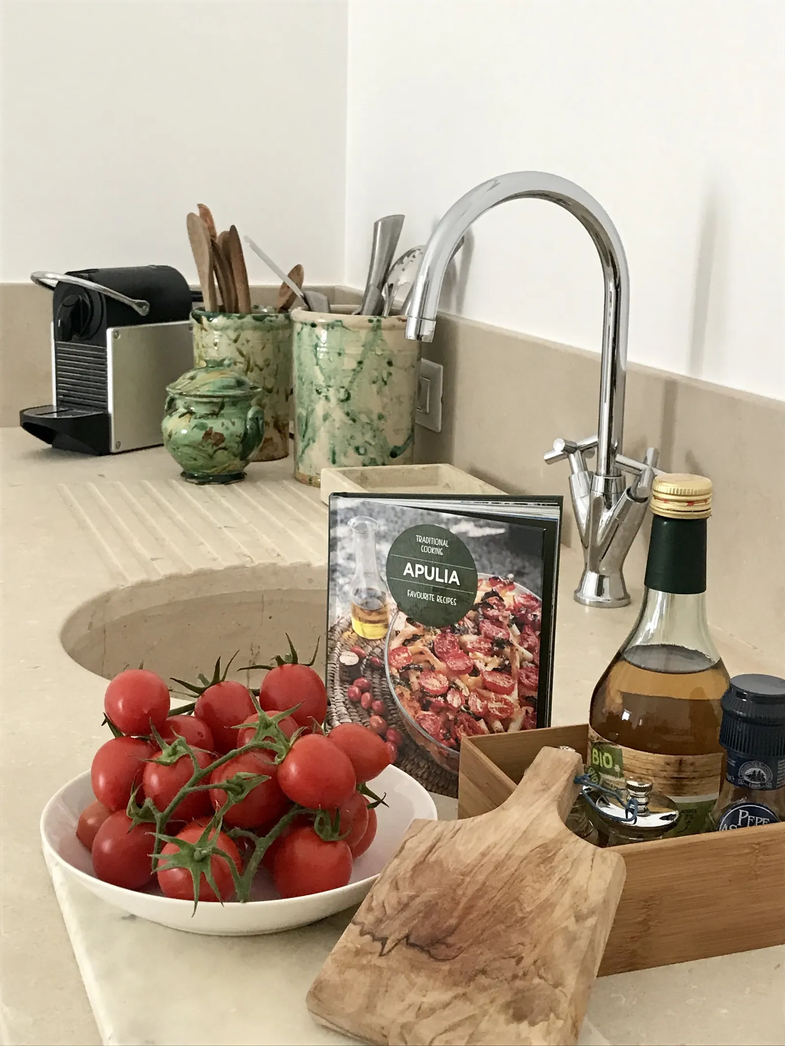 Kitchen counter with tomatoes and local produce