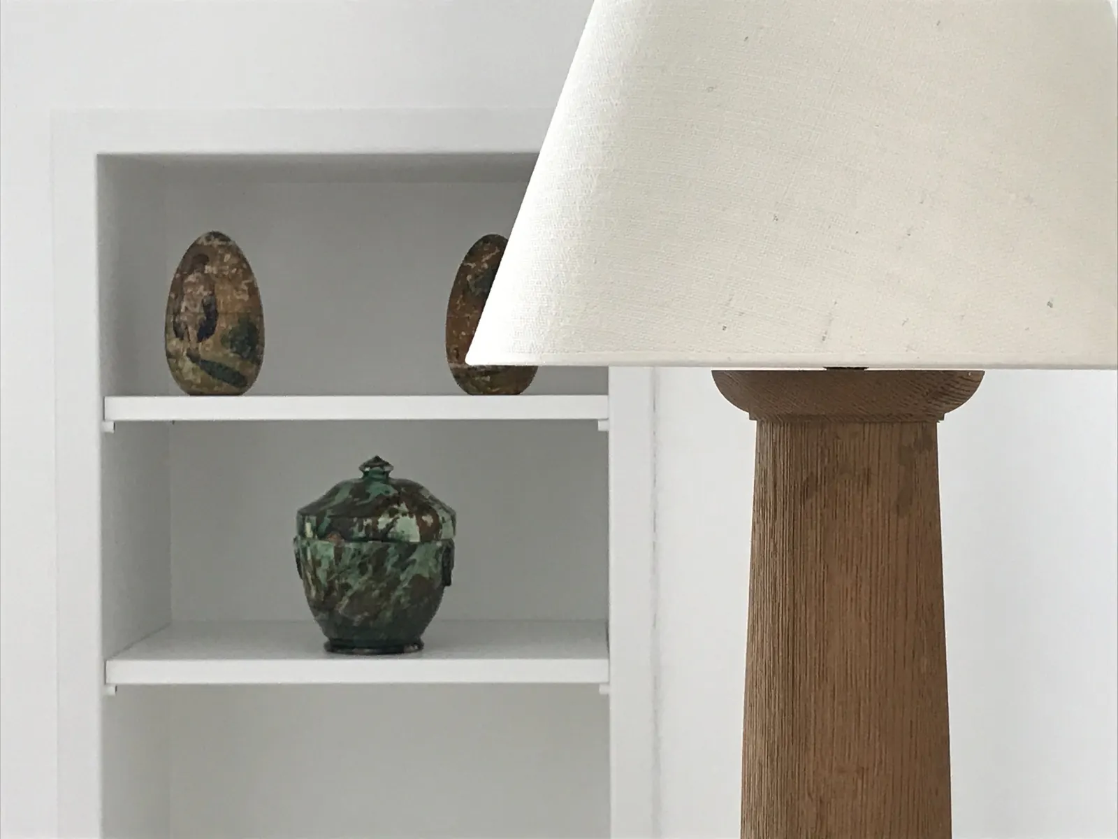 Ceramic pieces on a shelf