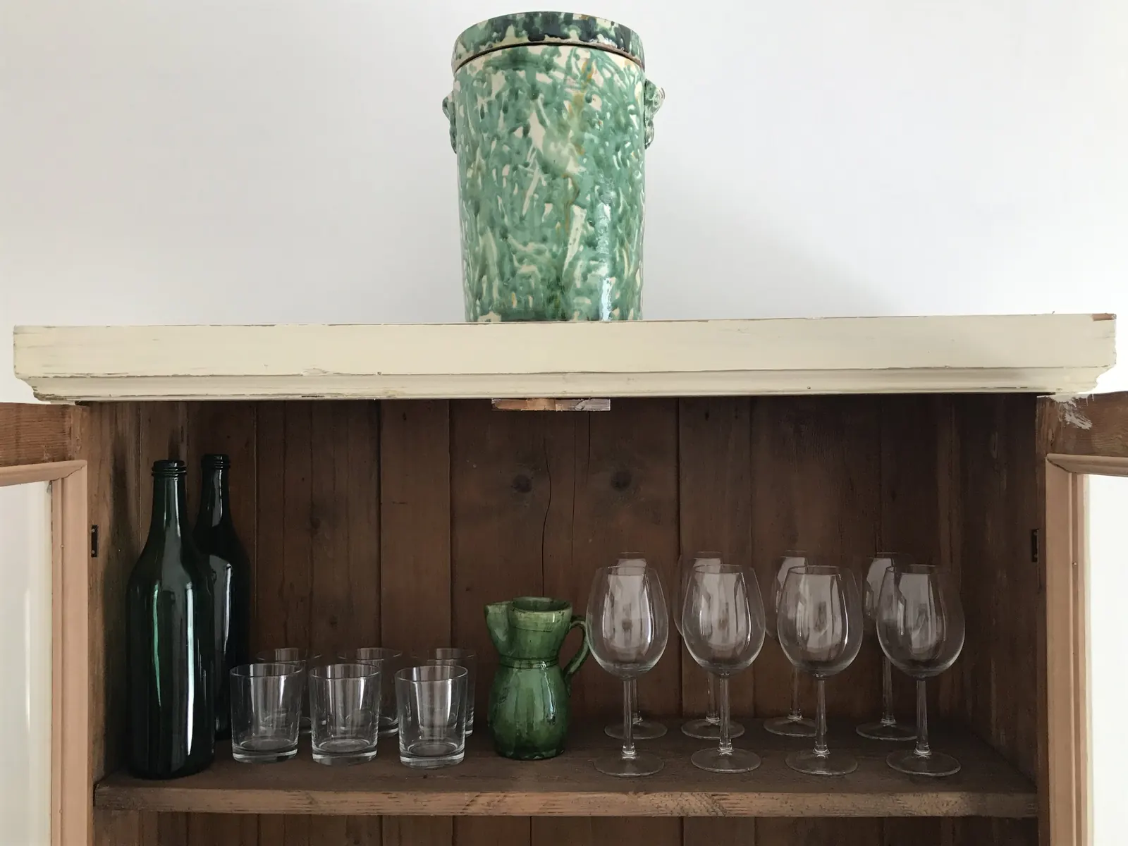 Glassware in an antique cabinet
