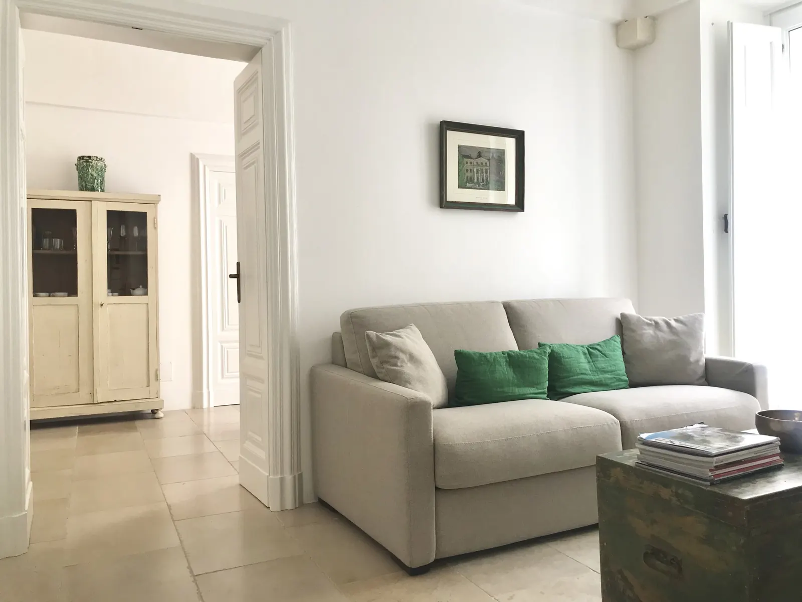 Sitting room with sofa and dresser