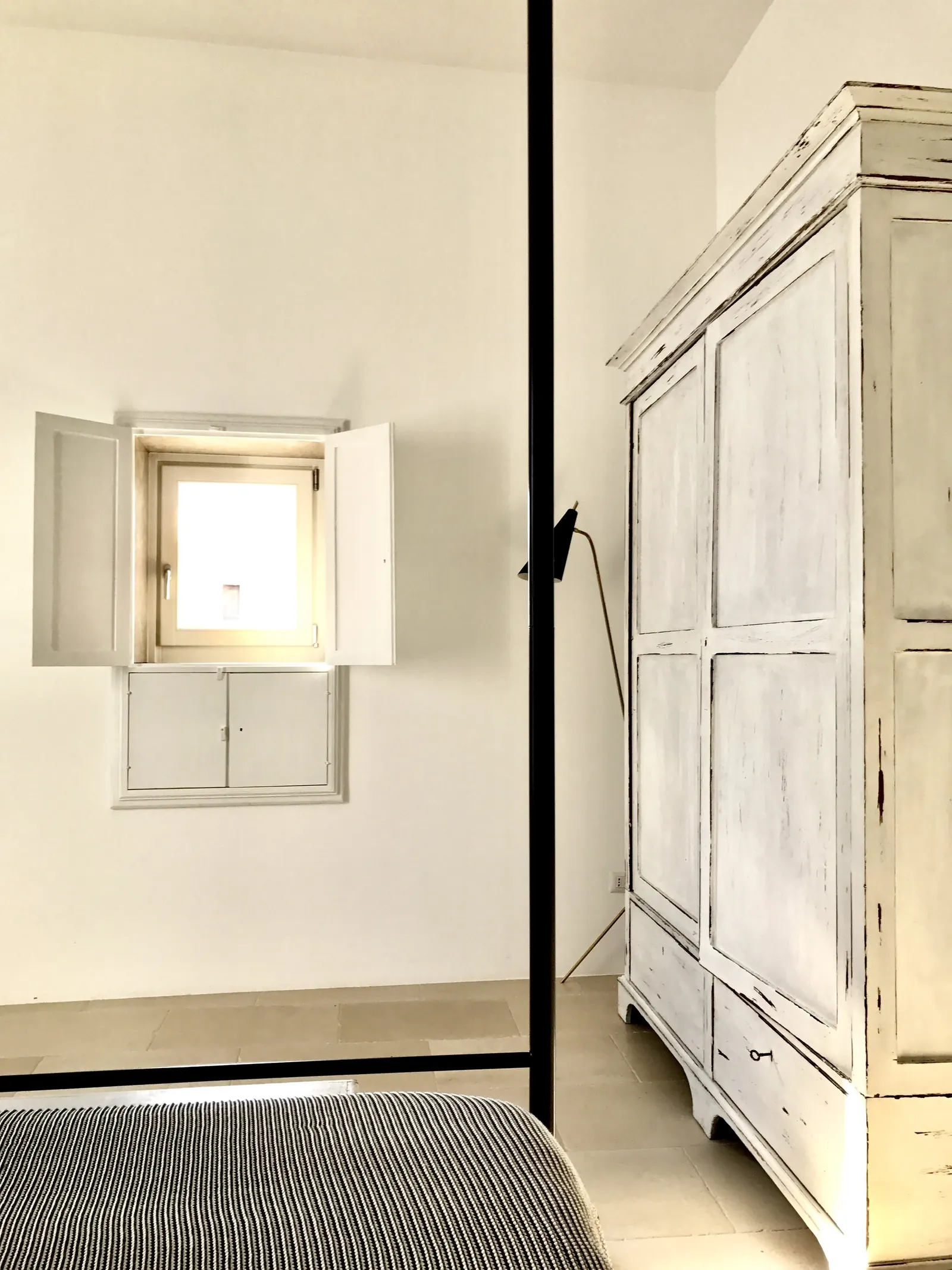 Bedroom window and wardrobe