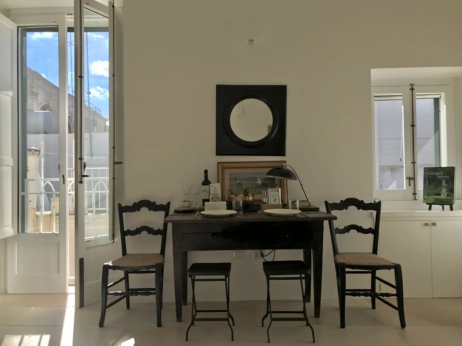 Dining table by the balcony doors