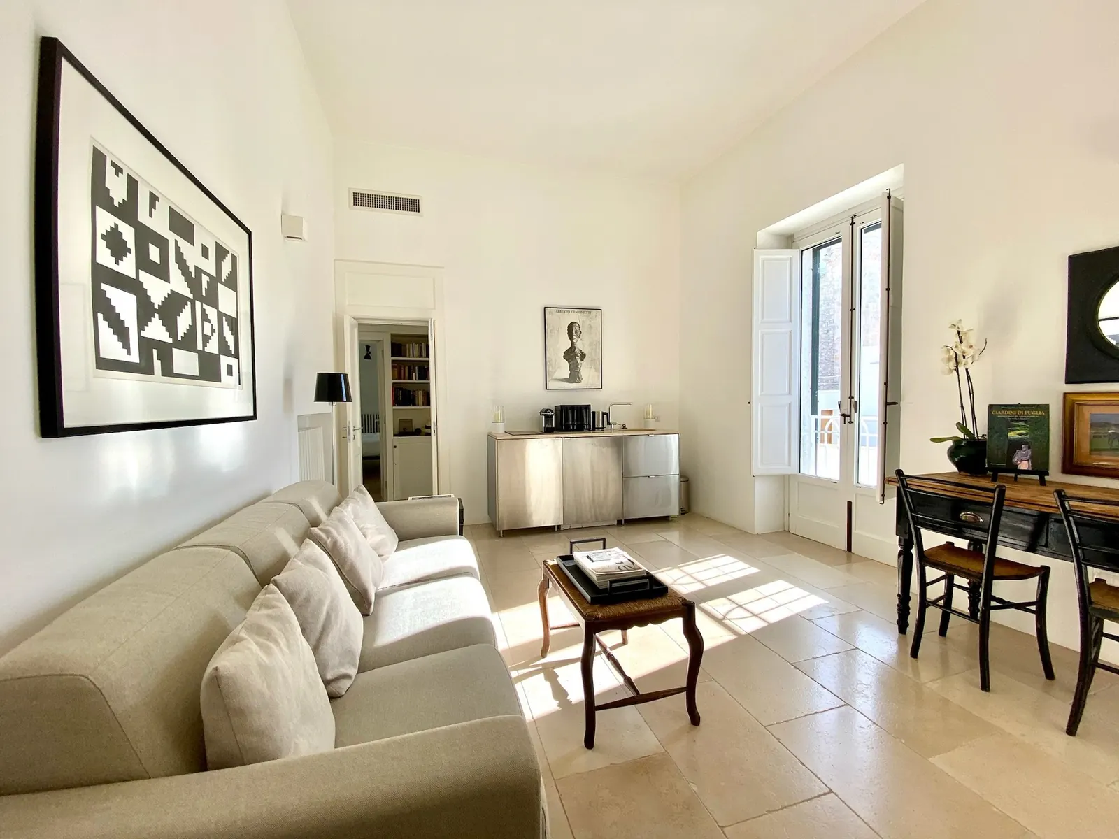 Sitting room with sofa and artwork