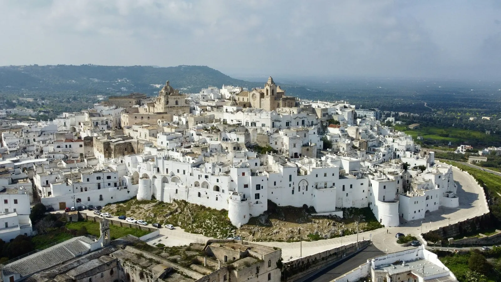 Aerial view of the whitewashed old town of Ostuni on its hill